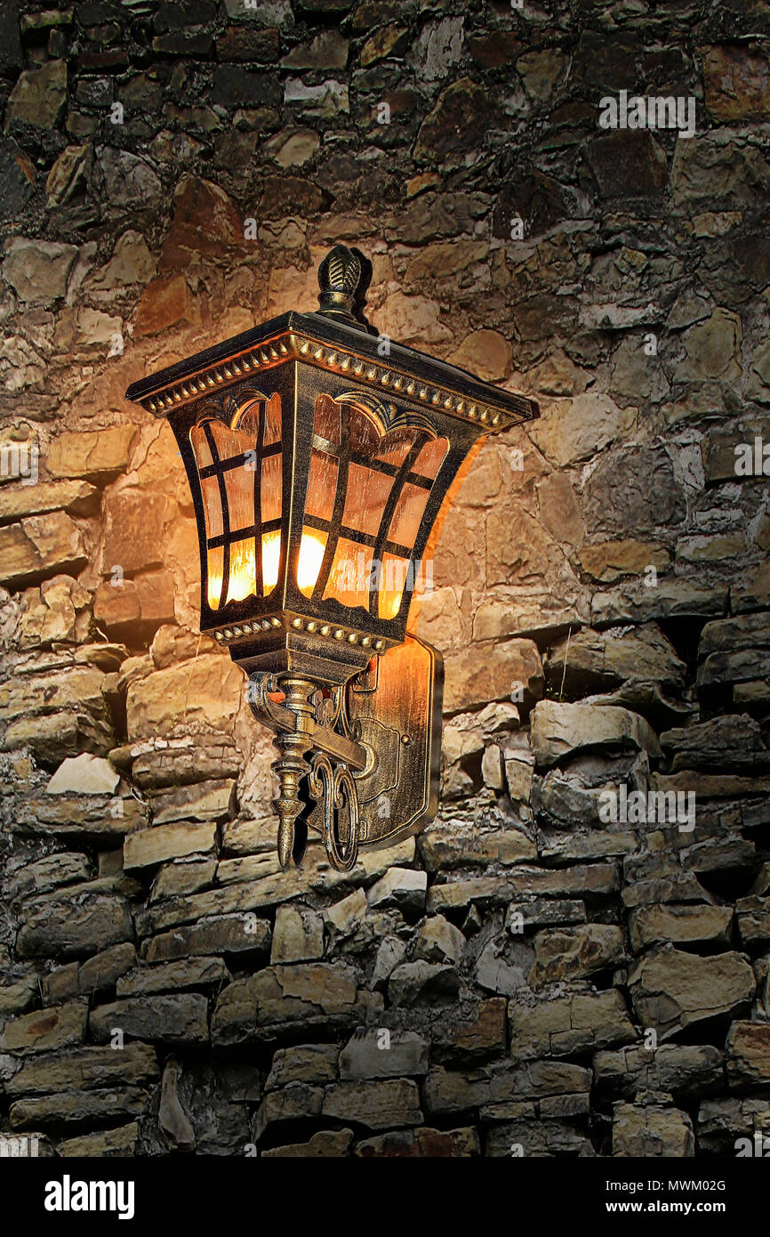 Magical romantic shimmer of vintage old metallic lantern hanging