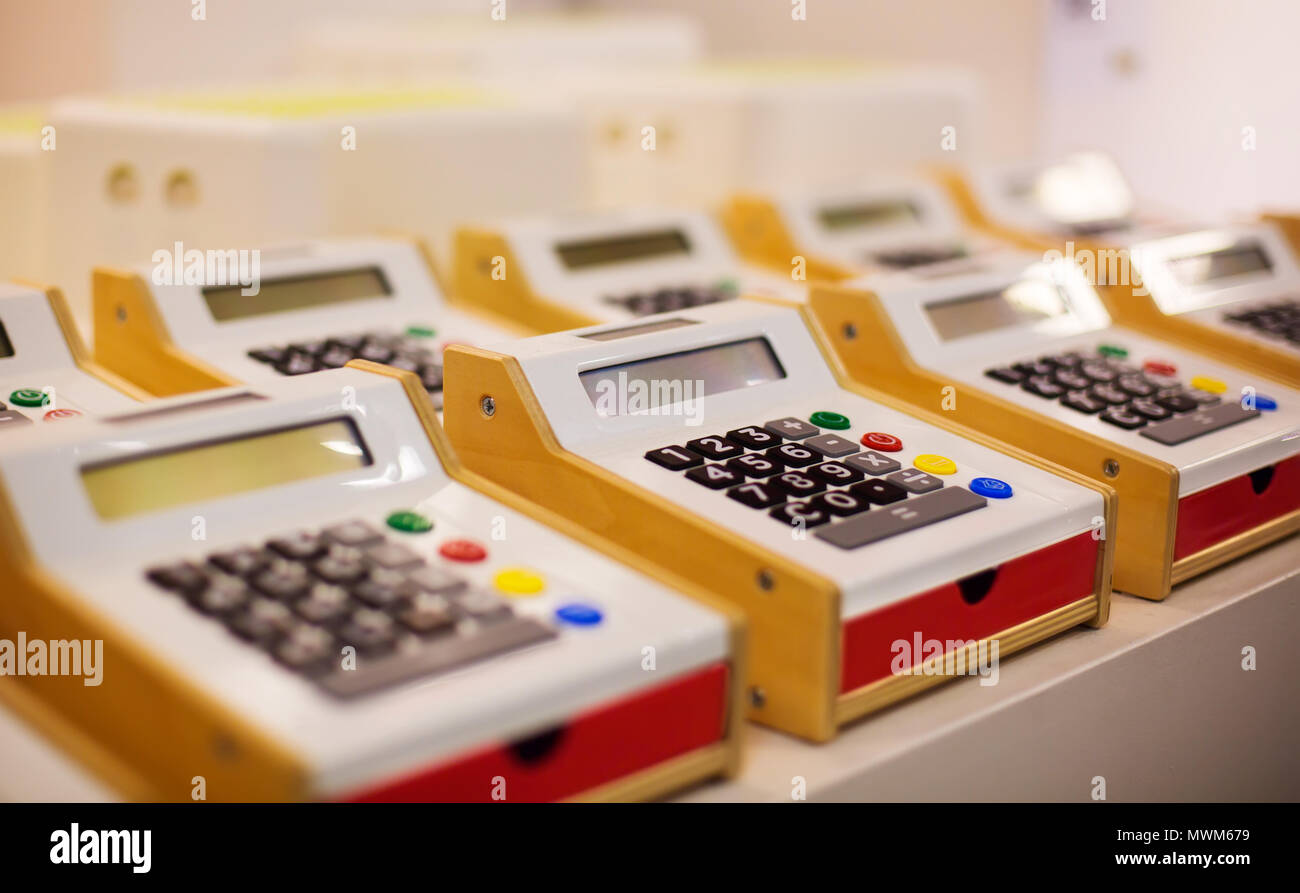 Toy cash registers for kids on display in store Stock Photo Alamy