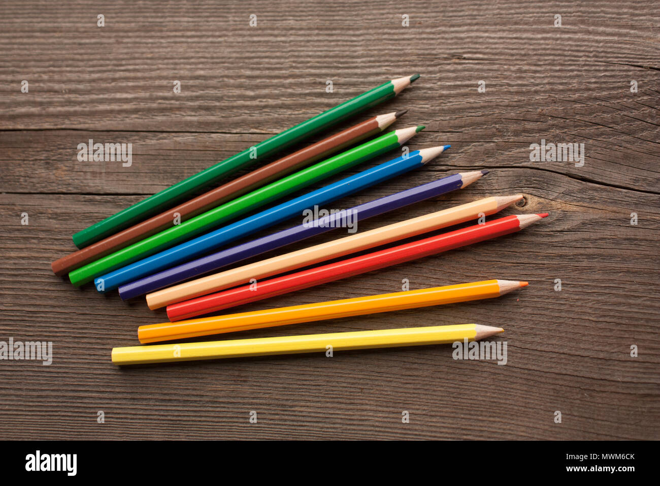 Coloured pencils on wooden hi-res stock photography and images - Alamy