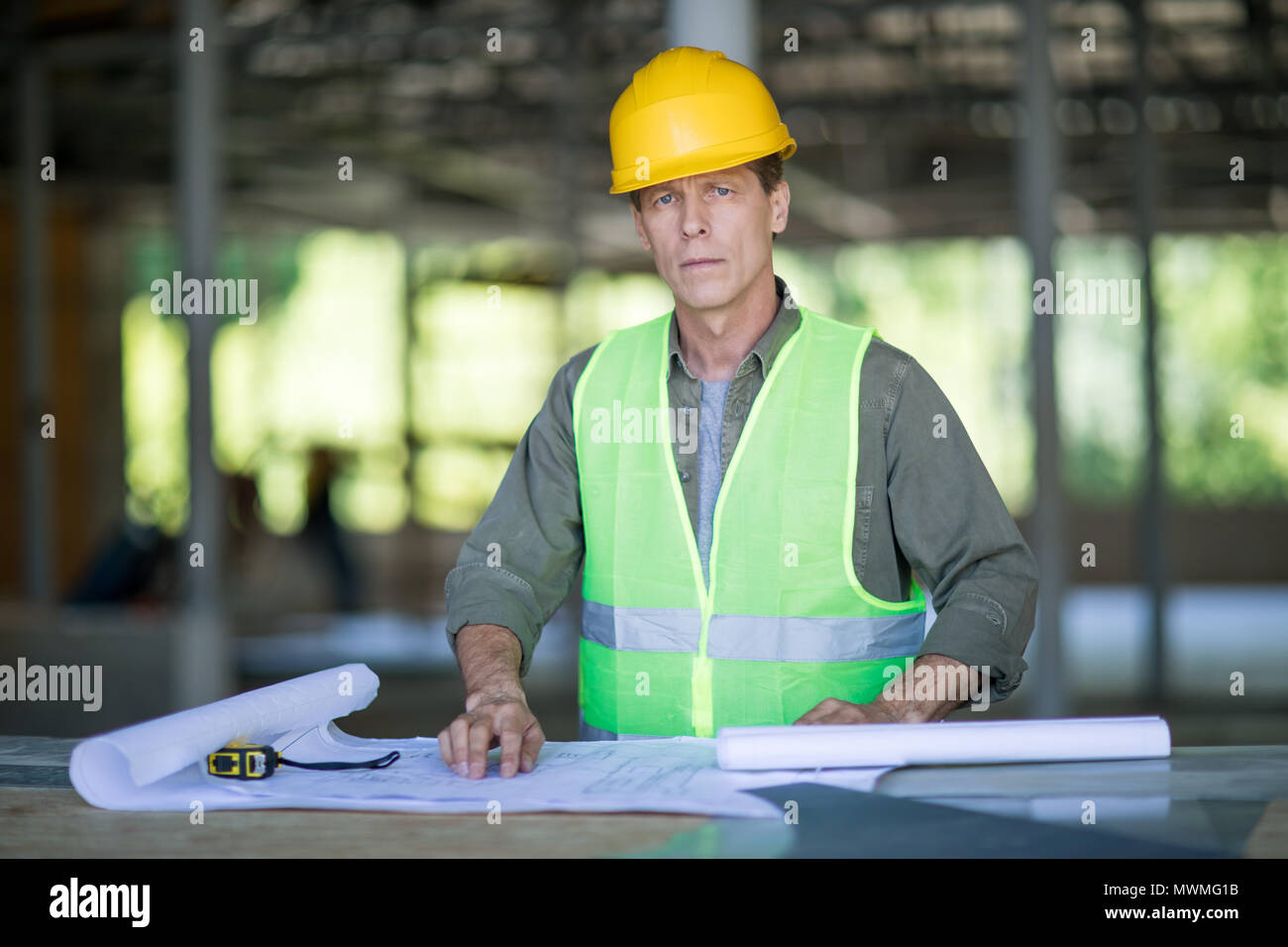 Serious architect hard hat hi-res stock photography and images - Alamy