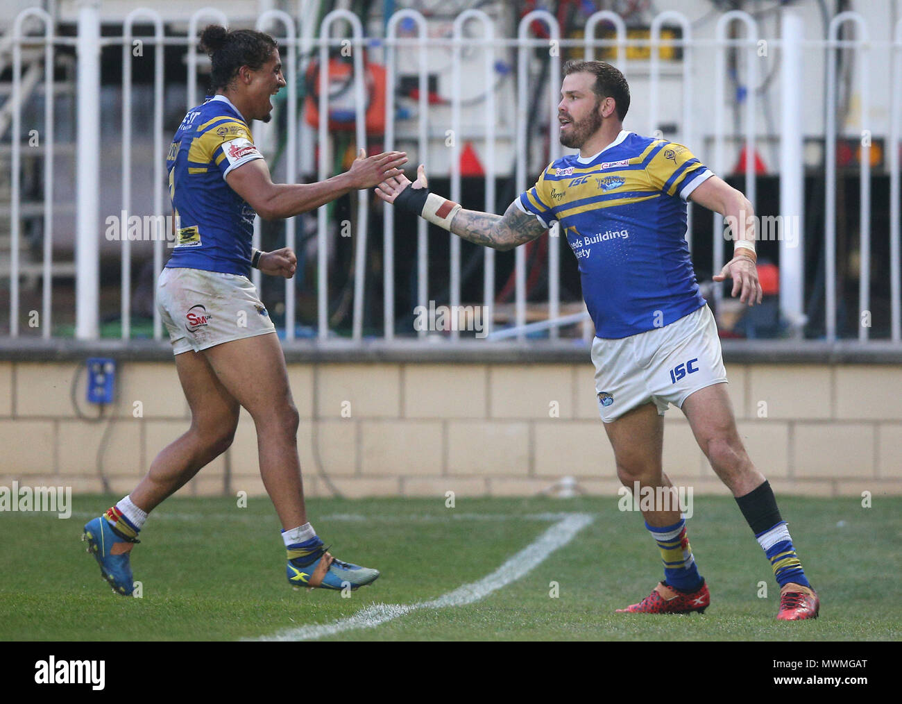 Leeds Rhinos Adam Cuthbertson (right) celebrates with Ashton Golding
