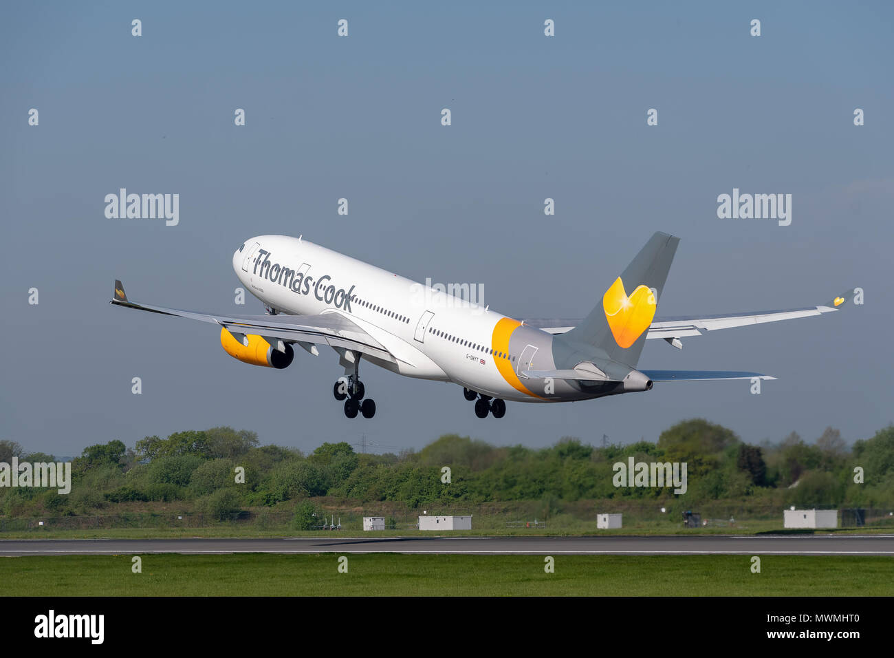 MANCHESTER, UNITED KINGDOM - MAY 07, 2018: Thomas Cook Airlines Airbus A330 departing Manchester airport Stock Photo