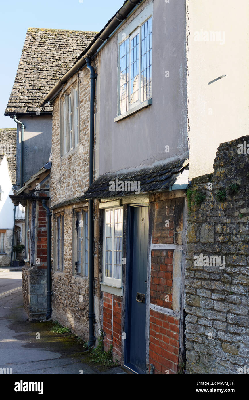 Old stone wall with windows Stock Photo - Alamy