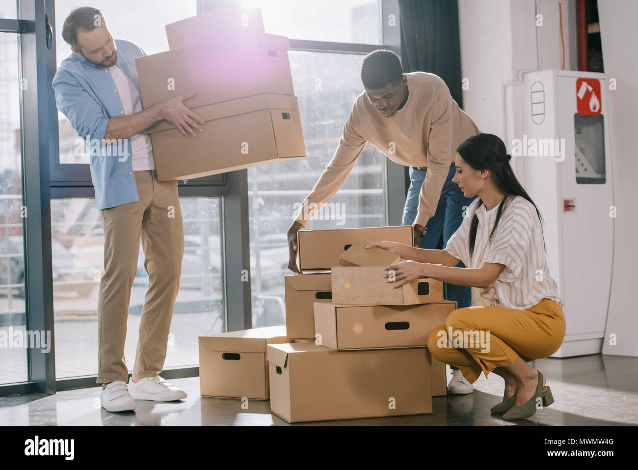 African business people moving boxes hi-res stock photography and ...