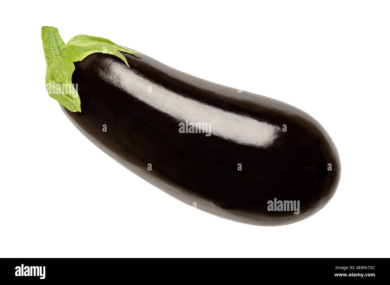 Eggplant from above. Solanum melongena, also aubergine or brinjal. Nightshade. Elongated oval shaped, black skinned fruit, used for cooking. Photo. Stock Photo