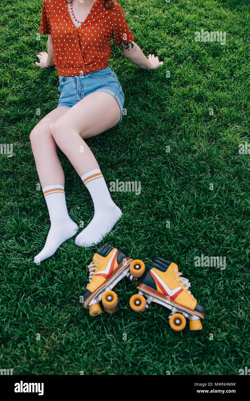 cropped shot of girl in denim shorts 