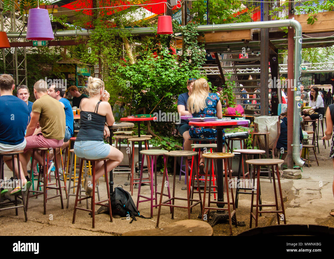 The garden of Szimpla Kert , one of the oldest Ruin Pubs In Budapest Stock Photo