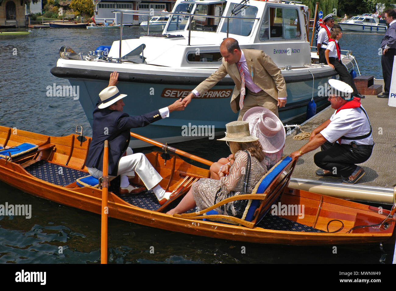 Spectators in a rowing boat, Henley Royal Regatta, Oxfordshire, UK Stock Photo
