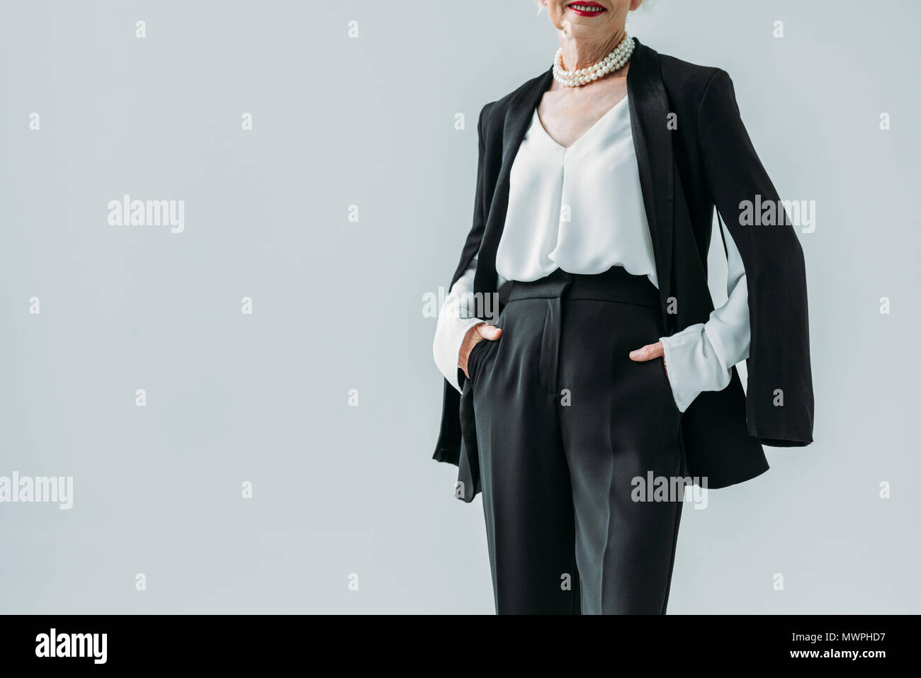 Lady in black suit hi-res stock photography and images - Alamy