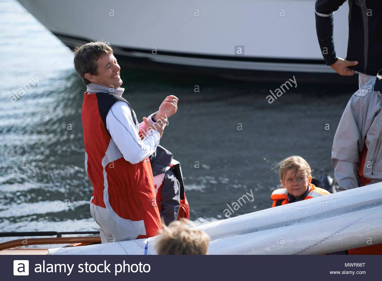 crown-prince-frederik-and-princess-isabella-crown-prince-frederik-sailing-with-children-prince-christian-and-princess-isabella-during-the-nordic-championship-in-dragon-sailing-at-baastad-sweden-MWR66T.jpg