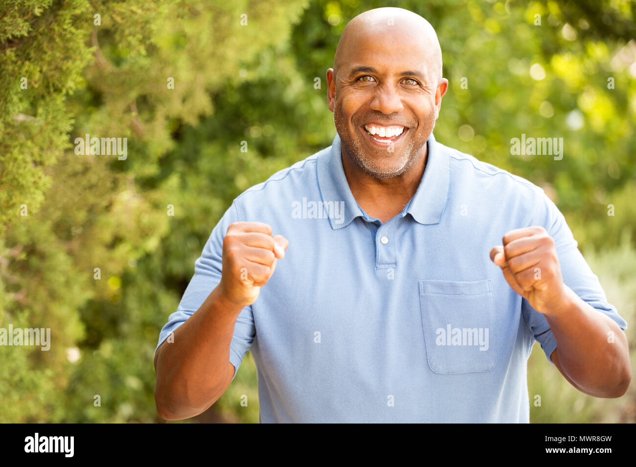 African American man pumping his fist. Stock Photo