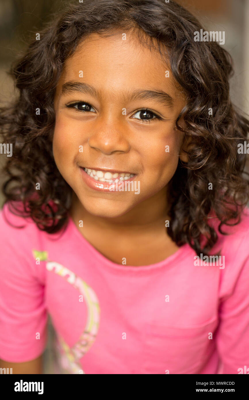 Cute hispanic little girl smiling. Stock Photo