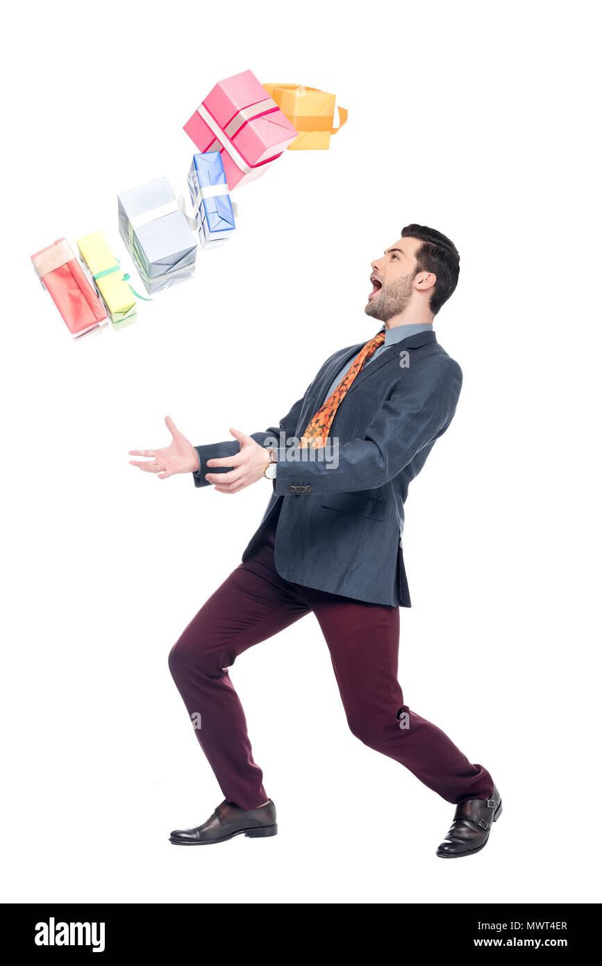 Man Raging Out Gift excited bearded man with falling gift boxes, isolated on white Stock ...