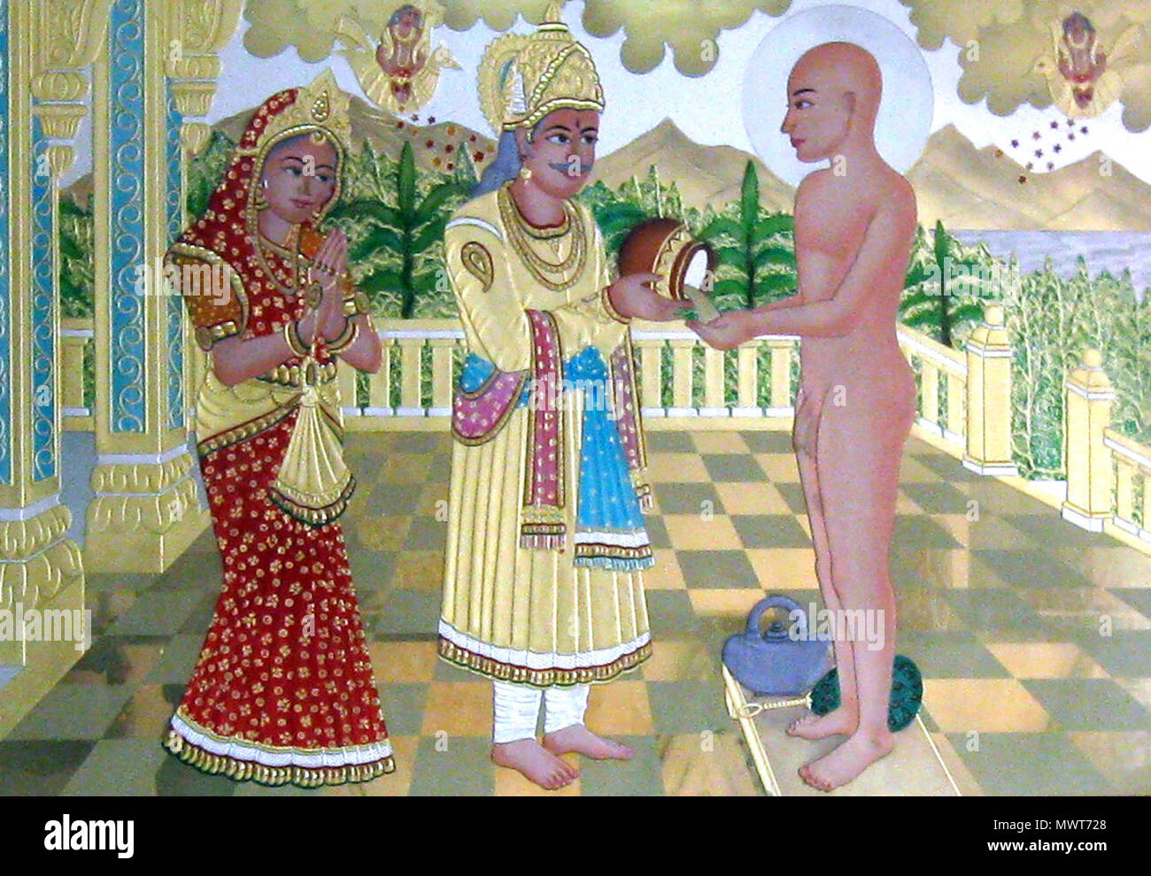 . English: This is Plate from temple shows Mahavira acception alms from Lay Jain householder. 19 December 2009. Anishshah19 388 Mahavira Accepting Alms Stock Photo