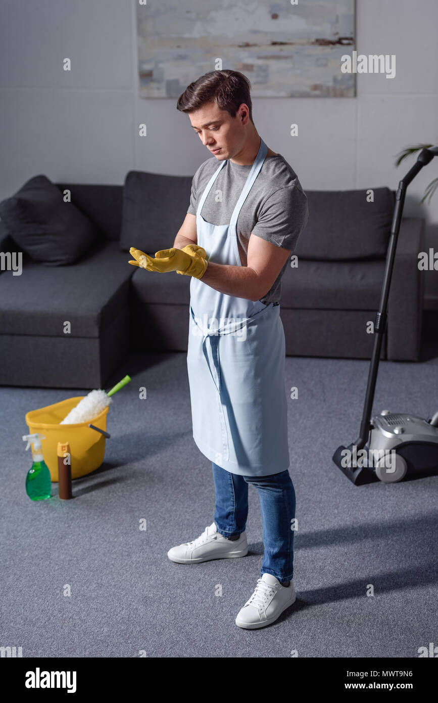 Man wearing rubber gloves hires stock photography and images Alamy
