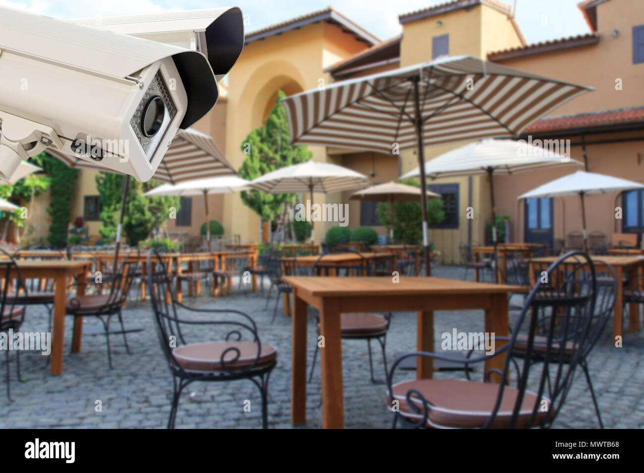 The CCTV Security Camera operating in the restaurant blur background