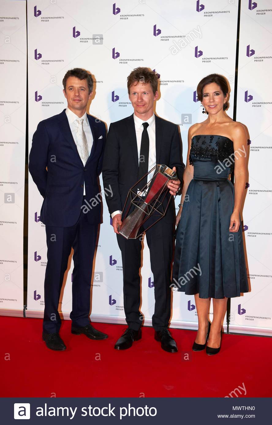 crown-prince-frederik-and-crown-princess-mary-crown-prince-frederik-and-crown-princess-mary-giving-the-crown-prince-couples-awards-in-soenderborg-crown-prince-couples-culture-award-went-to-artist-and-author-jakob-martin-strid-the-social-award-went-to-red-cross-the-stardust-prices-went-to-nive-nielsen-and-bjarke-mogensen-code-03624ll-MWTHN0.jpg