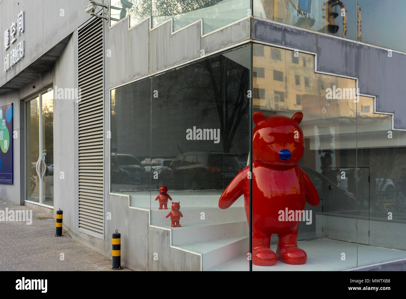 Red bear sculpture at the 798 Art Zone (Dashanzi Art District) in Beijing, China, Asia Stock Photo