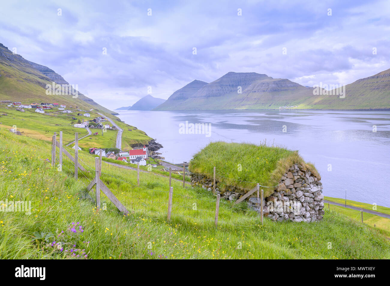 Traditional house with grass roof, Kunoy Island, Nordoyar, Faroe Islands, Denmark, Europe Stock Photo