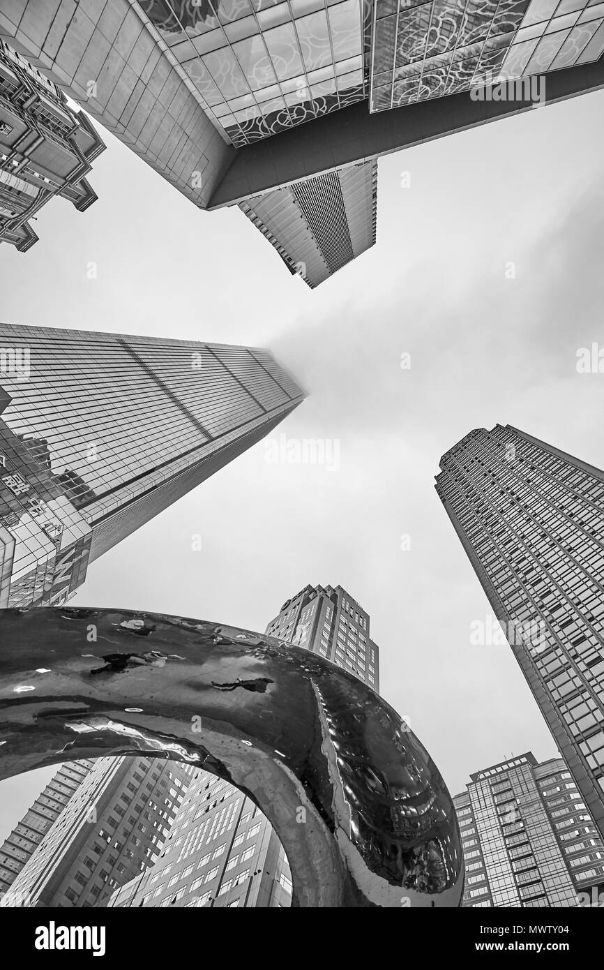 Chongqing, China - October 03, 2017: Looking up at modern skyscrapers in the city busines district. Stock Photo