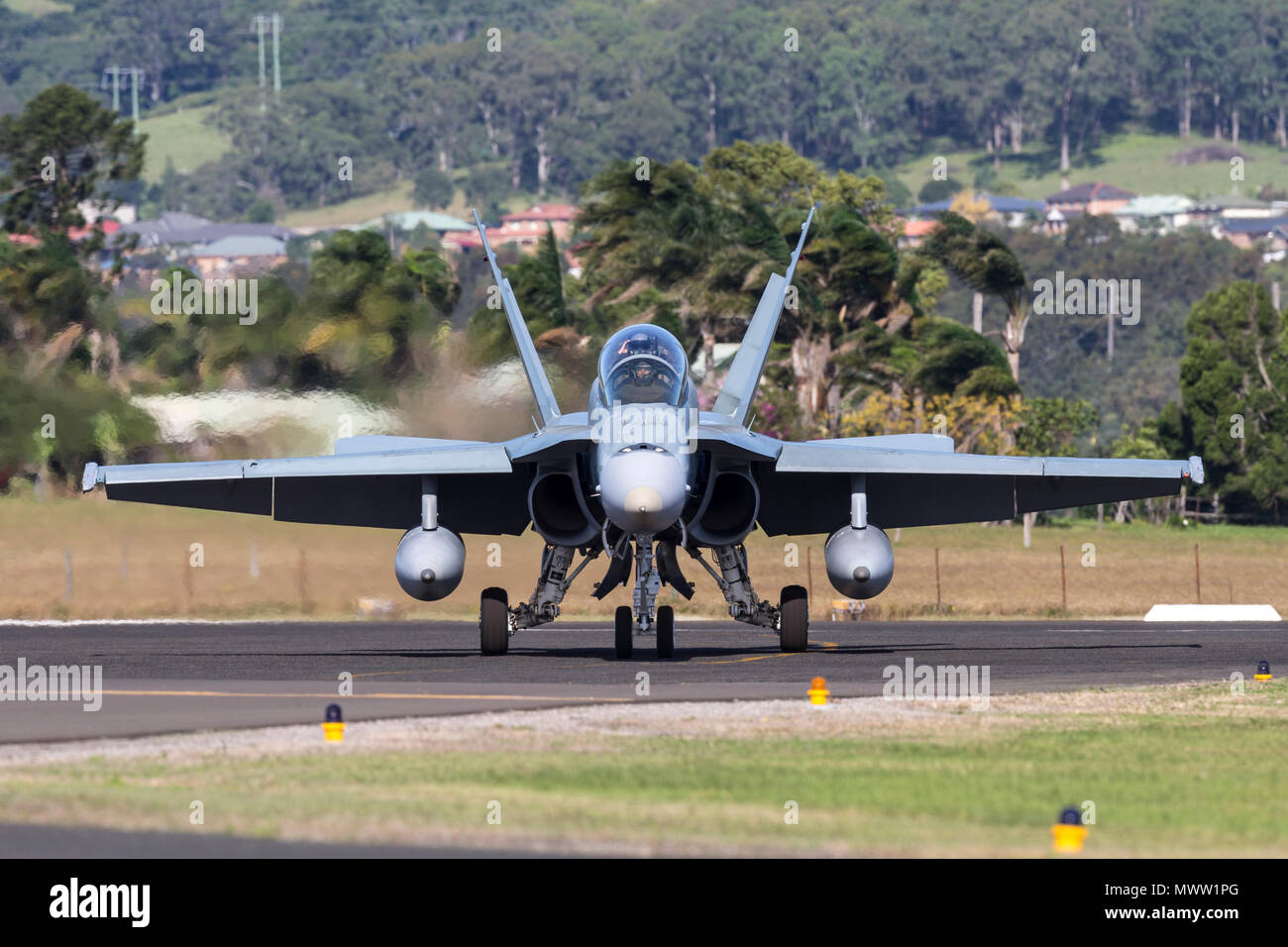 Royal Australian Air Force (RAAF) McDonnell Douglas F/A-18B Hornet jet aircraft A21-112 at Illawarra Regional Airport. Stock Photo