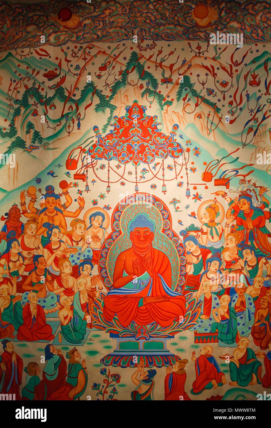 . English: Amitabha Buddha in the western pure land of Sukhavati. Dunhuang, Mogao Caves, China, Tang Dynasty. 28 June 2009. File created by user 'pandahermit.' Artwork created by anonymous ancient source. 42 Amitabha Buddha Sukhavati Dunhuang Mogao Caves Stock Photo