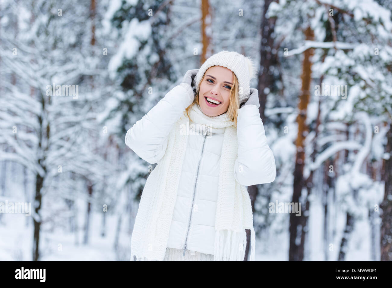 portrait of beautiful happy woman in snowy winter forest Stock Photo ...