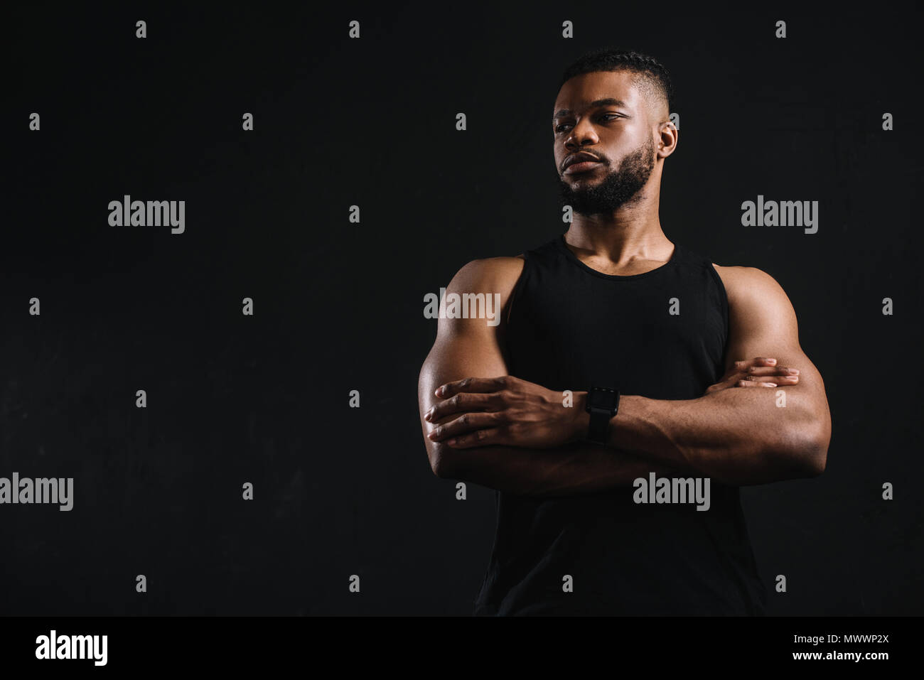 Arms crossed african sportsman hi-res stock photography and images - Alamy