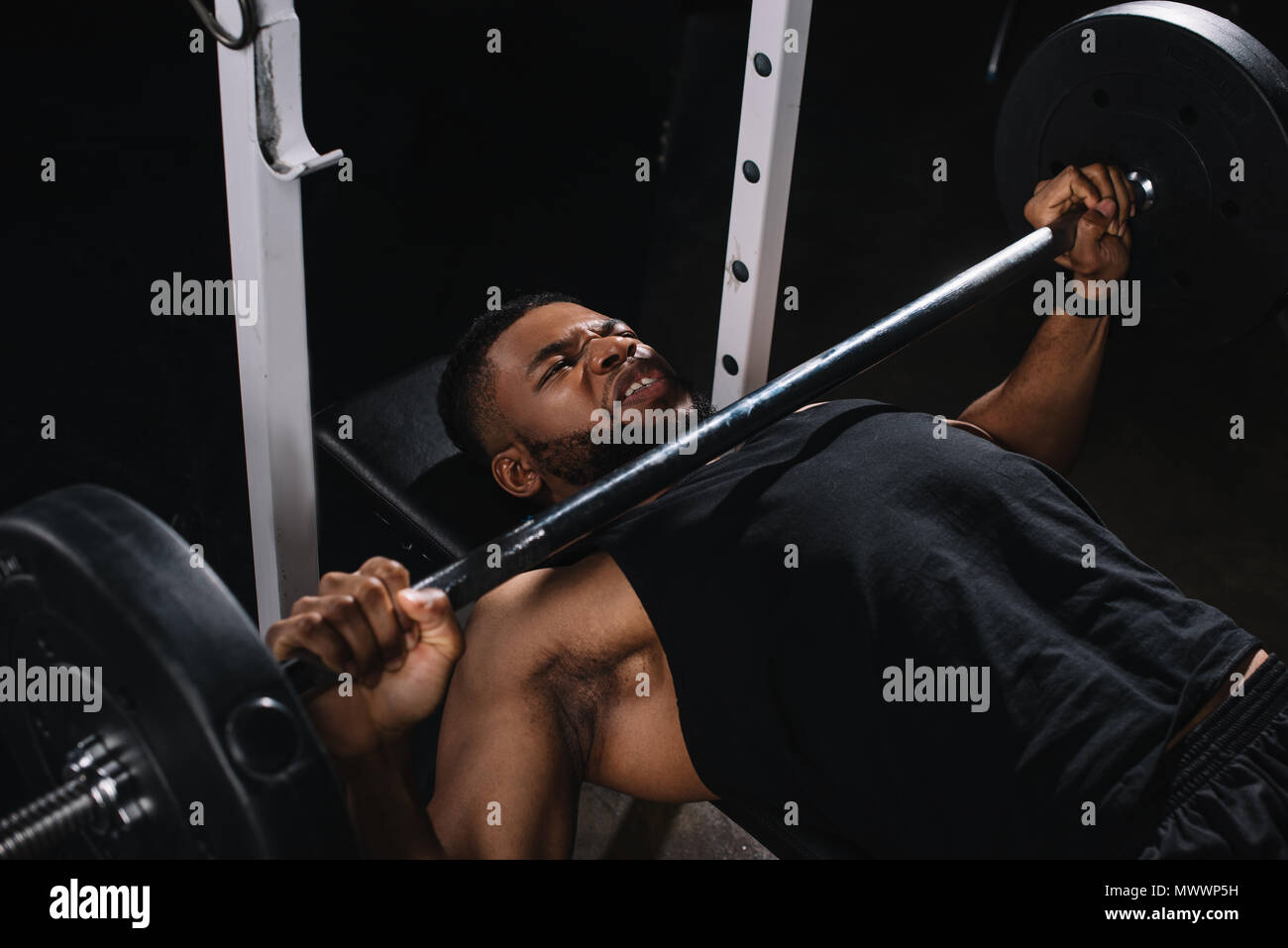 African american sportsman working barbell hi-res stock photography and ...