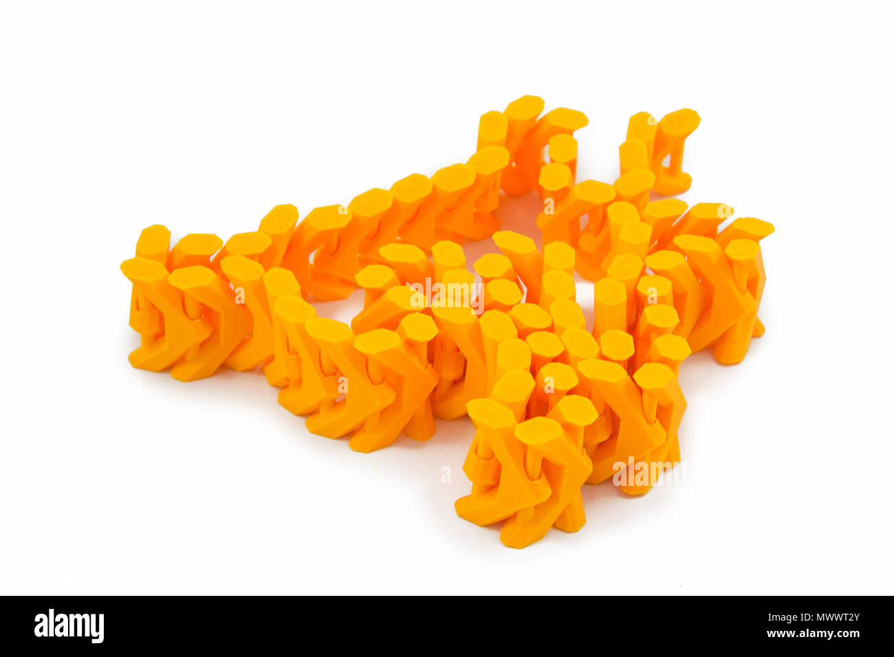 Orange Chain Shaped Object Printed With 3D Printer Stock Photo