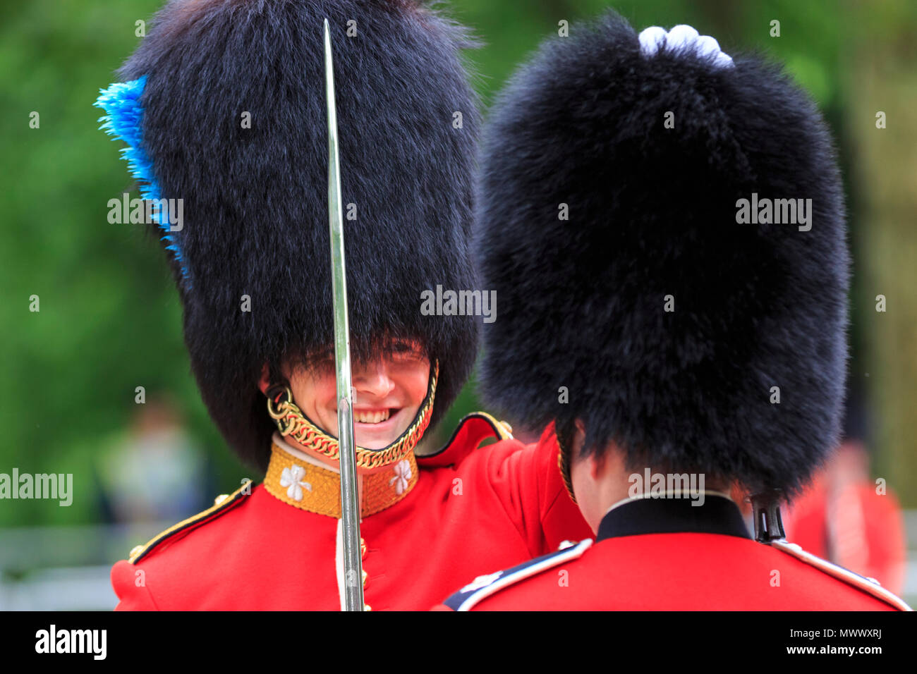 London, UK. 2nd June 2018. A superior inspects one of his soldiers' uniform detail and checks the posture. Londoners and tourists enjoy watching the procession and display of pageantry by troops from the Household Division at The Colonel's Review of Trooping the Colour on the Mall in Westminster. The Colonel's Review is the second and final full public rehearsal of Trooping the Colour, one week before the Queen's Birthday Parade. It takes place along The Mall and at Horse Guards Parade. Credit: Imageplotter News and Sports/Alamy Live News Stock Photo