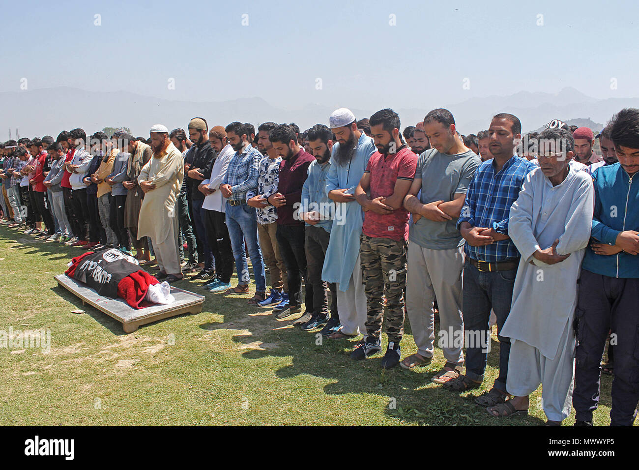 Jammu and Kasmir, India. 2nd June 2018.  People offer funeral prayers of 23 yr old orphan and lone brother of two sisters Qaiser Amin who succumbed to his injuries after Indian paramilitary vehicle ran over him during anti India protest in Srinagar the summer capital of Indian controlled Kashmir on June 02, 2018. Police fired teargas canisters, pellets and stun grenades on the funeral of Qaiser when people were taking the dead body for the burial. (Credit Image: © Faisal Khan Credit: ZUMA Press, Inc./Alamy Live News Stock Photo