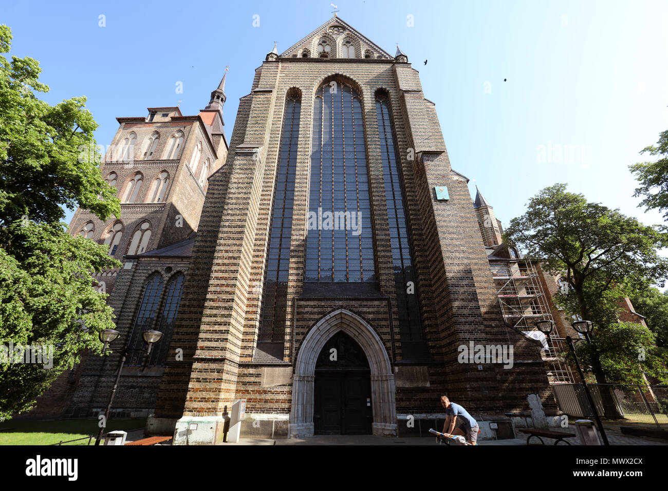30 May 2018, Germany, Rostock: St. Mary's Church is a prominent example of the historic architecture of Rostock, a North German city celebrating its 800th anniversary this year. Photo: Bernd Wüstneck/dpa Stock Photo