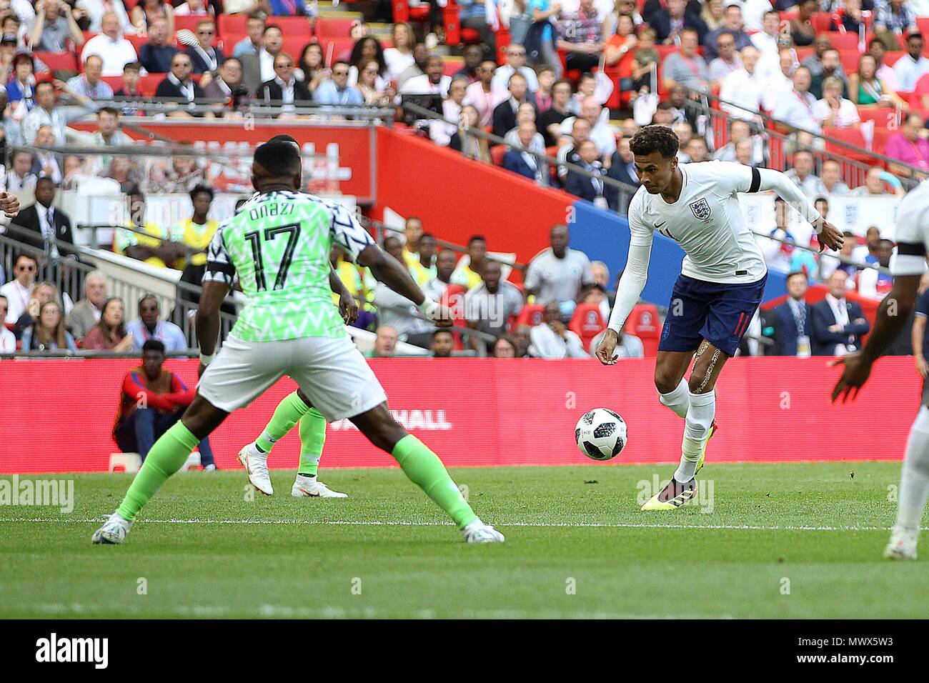 London, UK. 2nd June 2018. Dele Alli of England takes on Ogenyi Onazi of Nigeria during the International Friendly match between England and Nigeria at Wembley Stadium on June 2nd 2018 in London, England. (Photo by Matt Bradshaw/phcimages.com) Credit: PHC Images/Alamy Live News Stock Photo