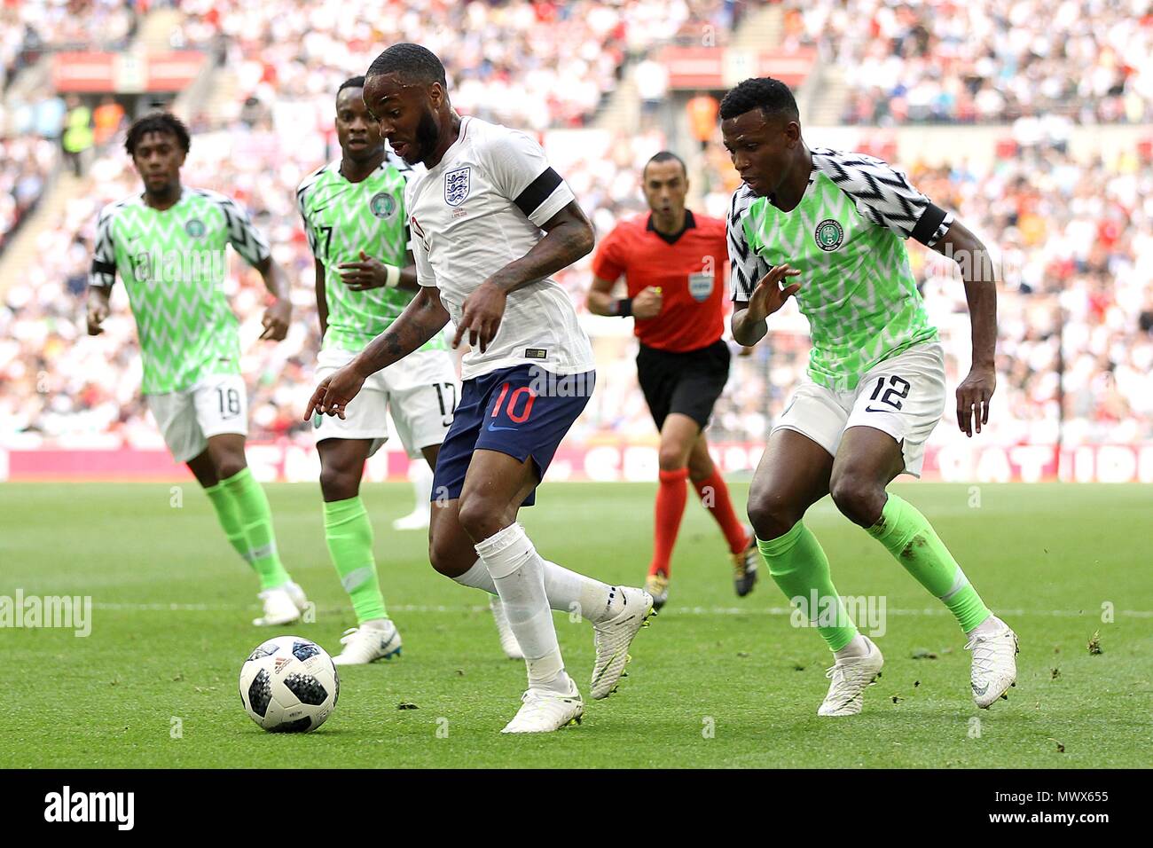 London, UK. 2nd June 2018. London, UK. 2nd June 2018. Raheem Sterling of England goes past Shehu Abdullahi of Nigeria during the International Friendly match between England and Nigeria at Wembley Stadium on June 2nd 2018 in London, England. (Photo by Matt Bradshaw/phcimages.com) Credit: PHC Images/Alamy Live News Stock Photo