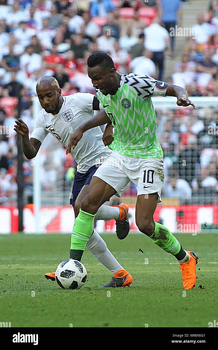 London, UK. 2nd June 2018. John Obi Mikel of Nigeria is challenged by Fabian Delph of England during the International Friendly match between England and Nigeria at Wembley Stadium on June 2nd 2018 in London, England. (Photo by Matt Bradshaw/phcimages.com) Credit: PHC Images/Alamy Live News Stock Photo