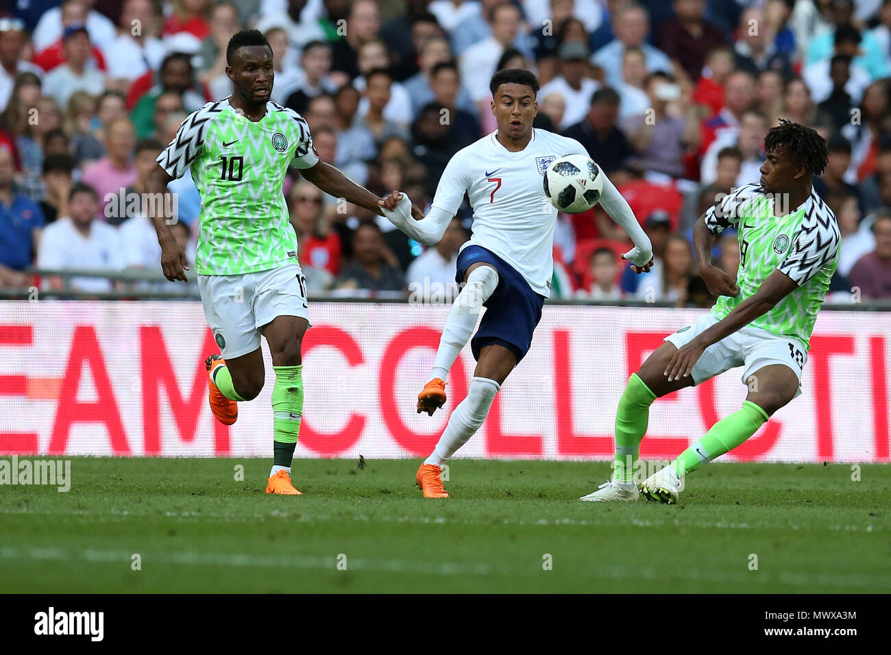 Wembley Stadium, London, UK. 2nd Jun, 2018. Jesse Lingard of England © with John Obi Mikel (l) and Alex Iwobi of Nigeria  in action. Football International friendly, England v Nigeria at Wembley Stadium in London on Saturday 2nd June 2018.  this image may only be used for Editorial purposes. Editorial use only, license required for commercial use. No use in betting, games or a single club/league/player publications. pic by Andrew Orchard//Andrew Orchard sports photography/Alamy Live news Stock Photo