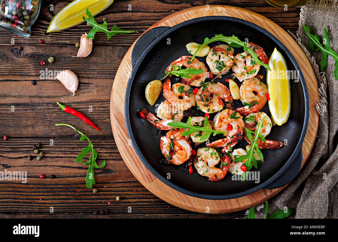 Prawns Shrimps roasted in garlic butter with lemon and parsley on