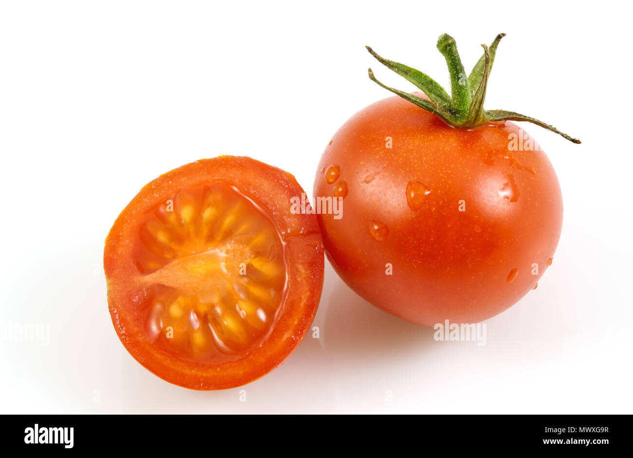 fresh red tomato isolated on white background, tomatoes whole and a ...