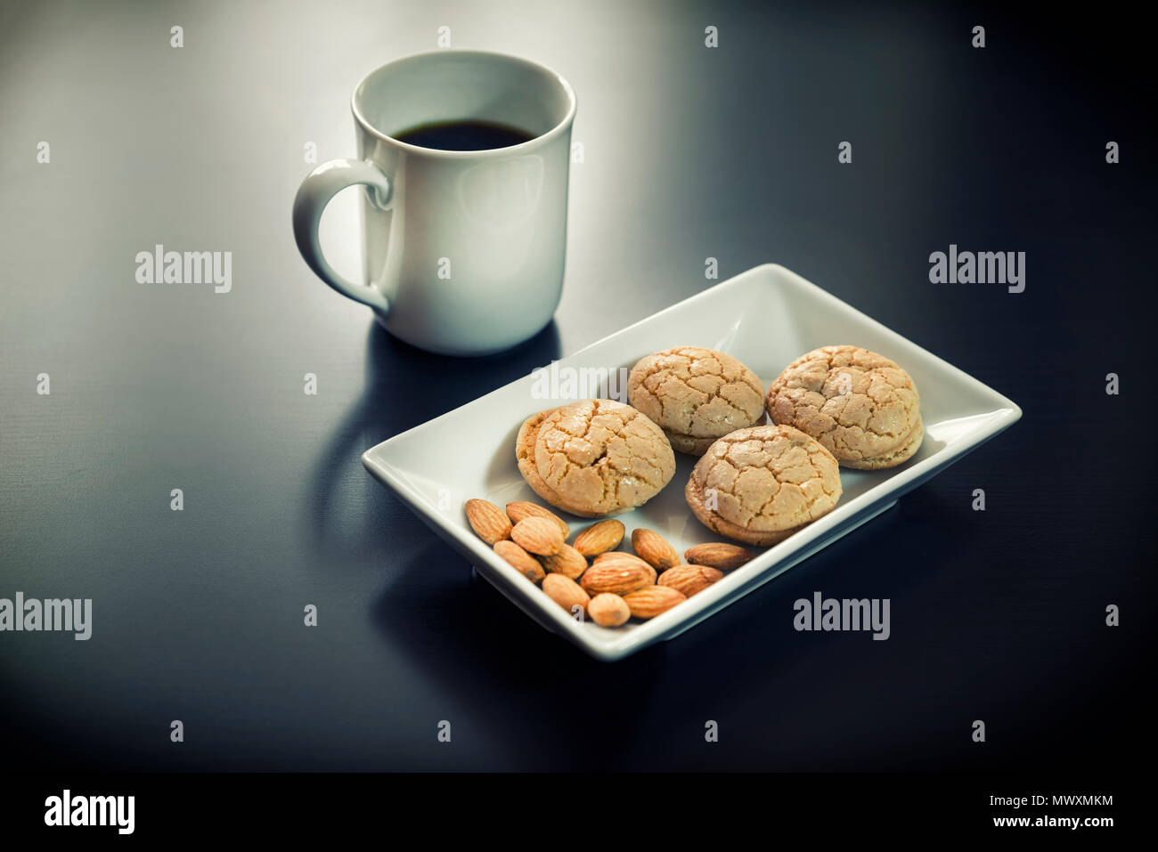 Almond Cookies And A Cup Of Coffee Stock Photo