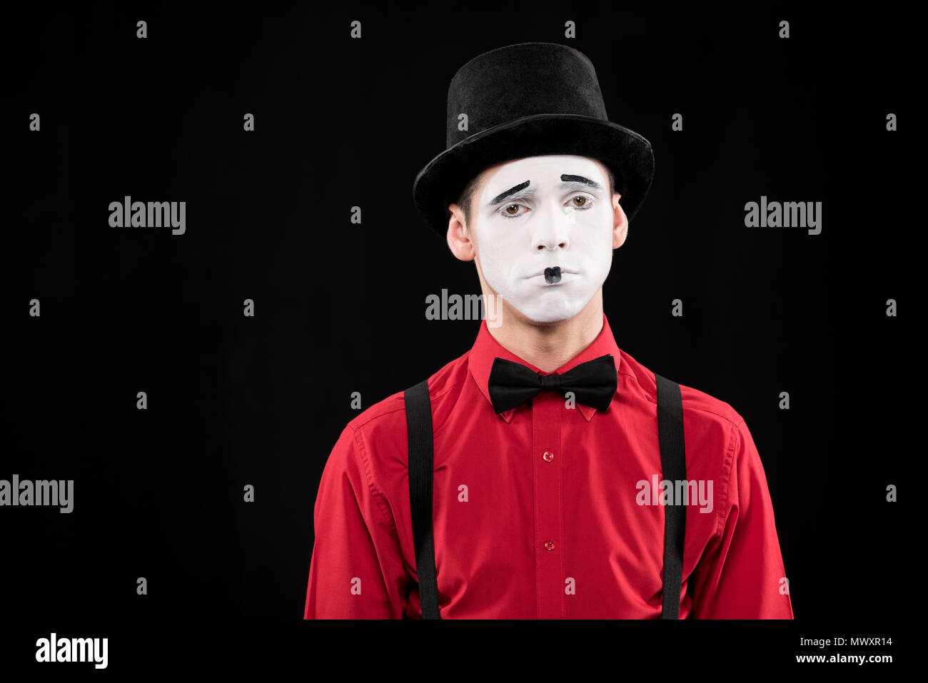 sad mime looking at camera isolated on black Stock Photo