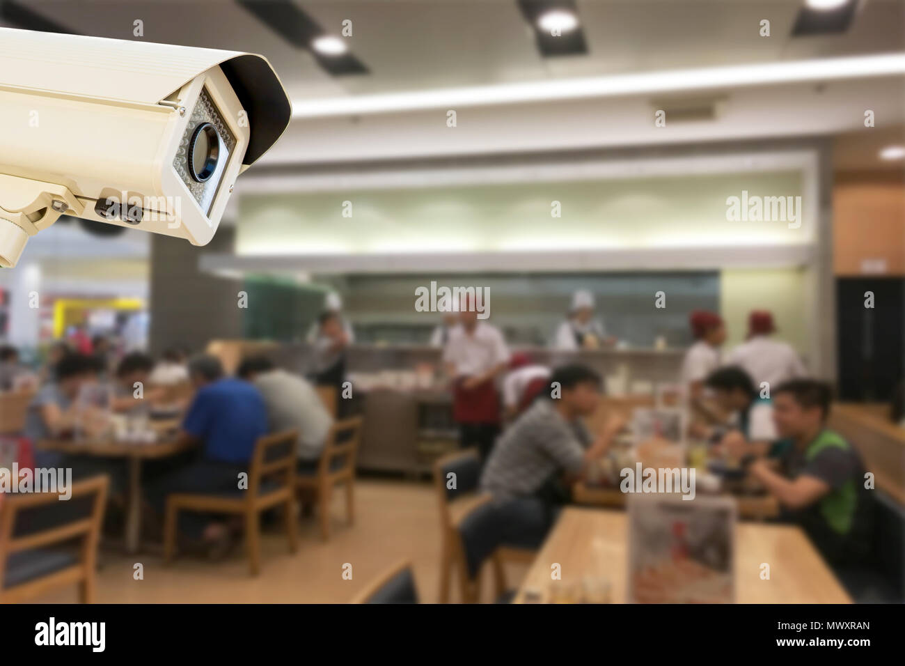 The CCTV Security Camera operating japaness restaurant blur background