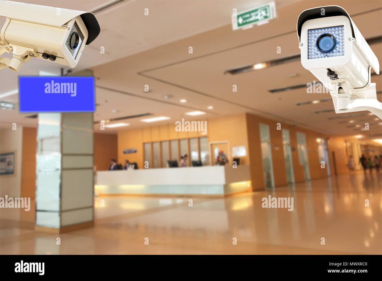 The CCTV Security Camera operating in hospital blur background Stock
