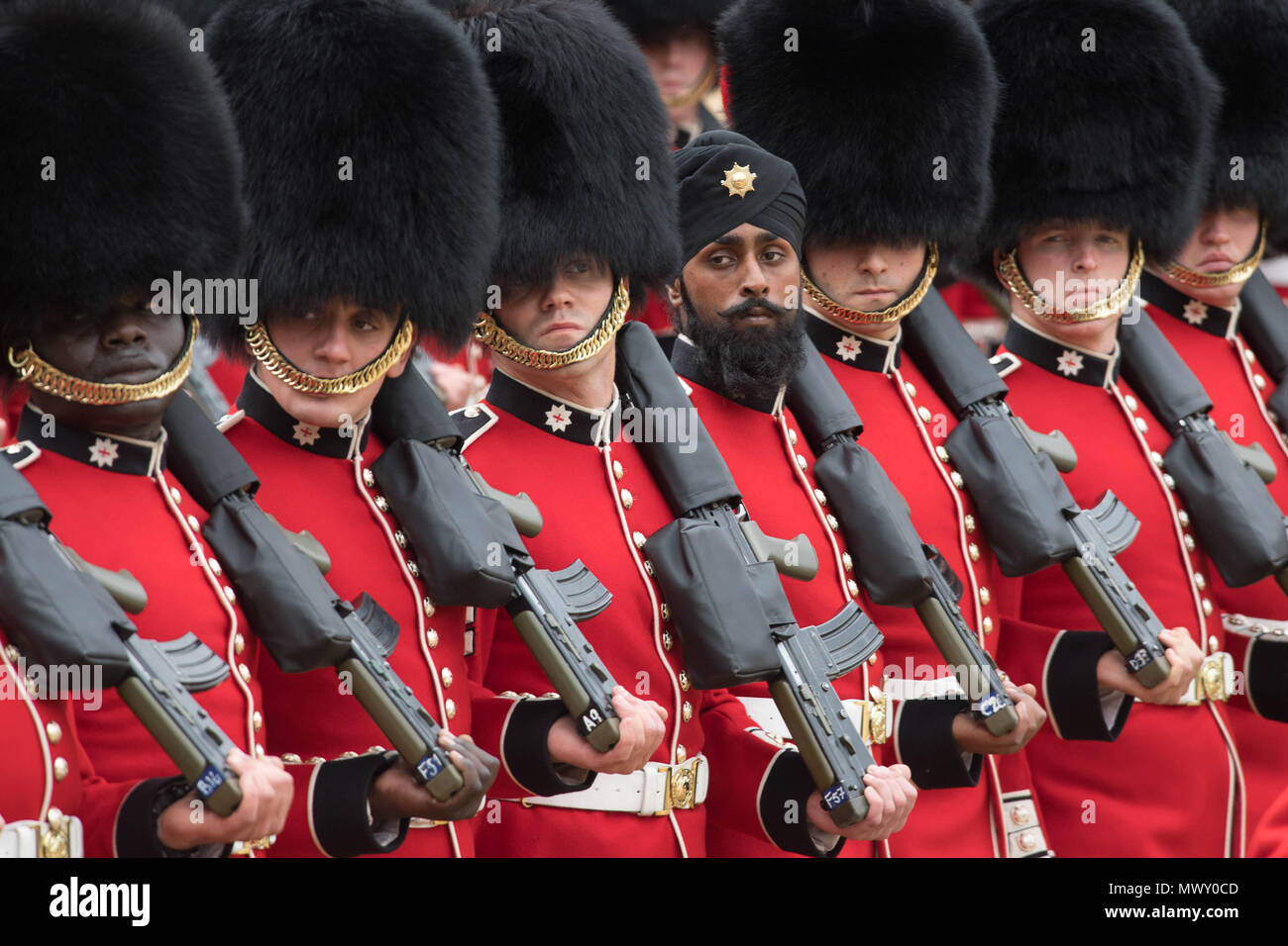 A Sikh member of the Coldstream Guards wearing a turban as he takes part in the Colonel's Review, the final rehearsal for Trooping the Colour, the Queen's annual birthday parade, in Central London. Stock Photo