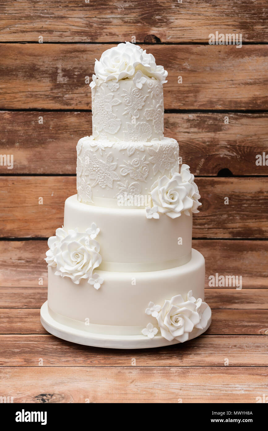 Four tier white wedding cake Stock Photo