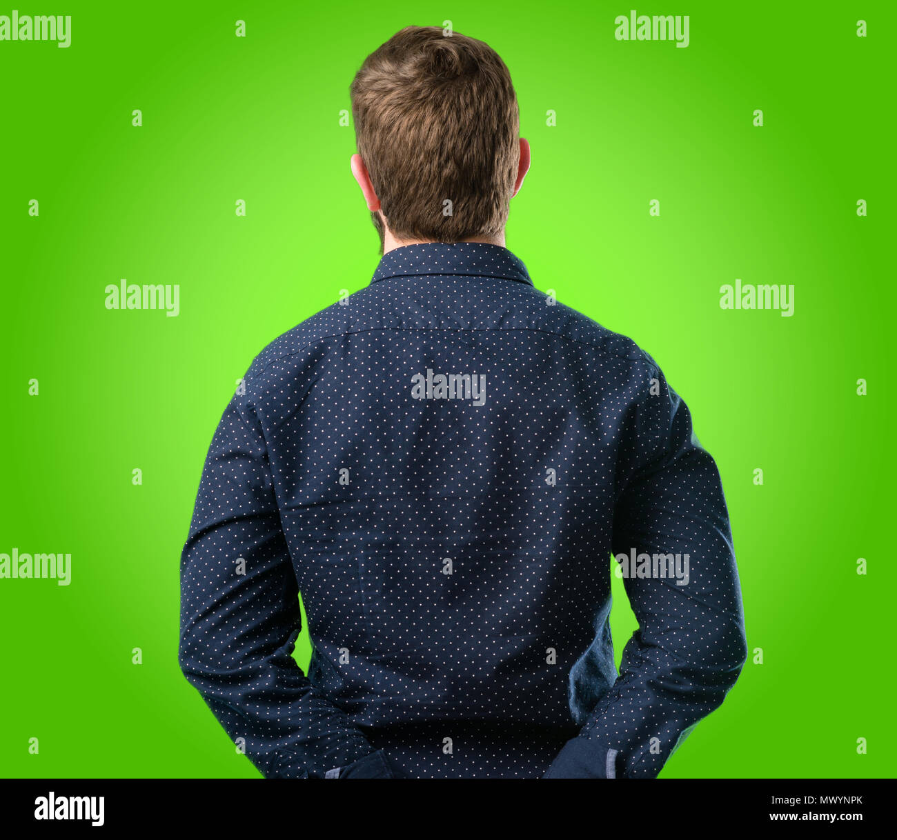 Man back head turned standing hi-res stock photography and images - Alamy