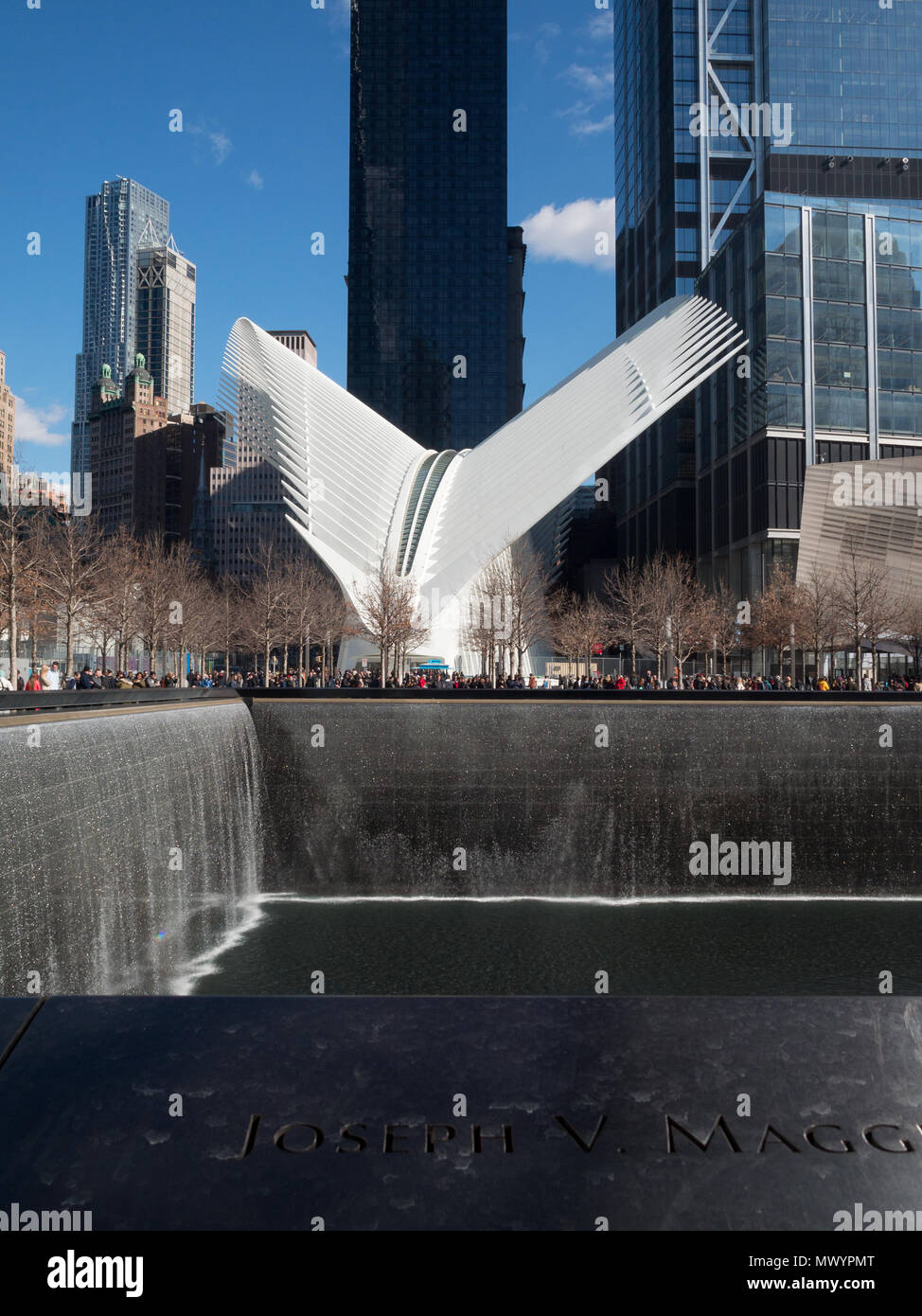 National September 11 Memorial North Pool with the Oculus in background Stock Photo