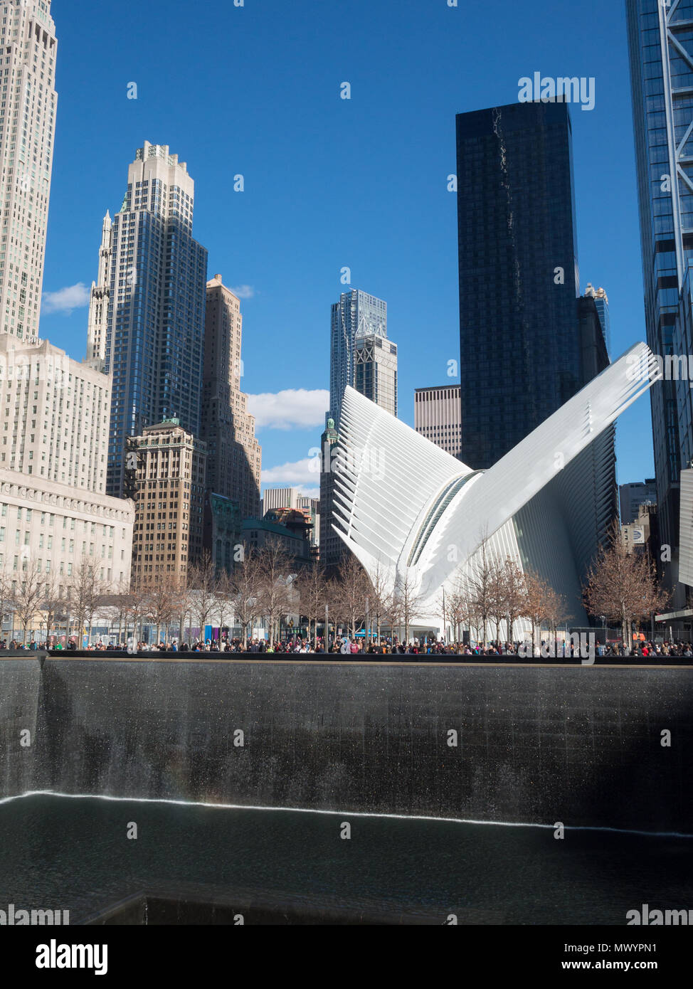 National September 11 Memorial North Pool with the Oculus in background Stock Photo