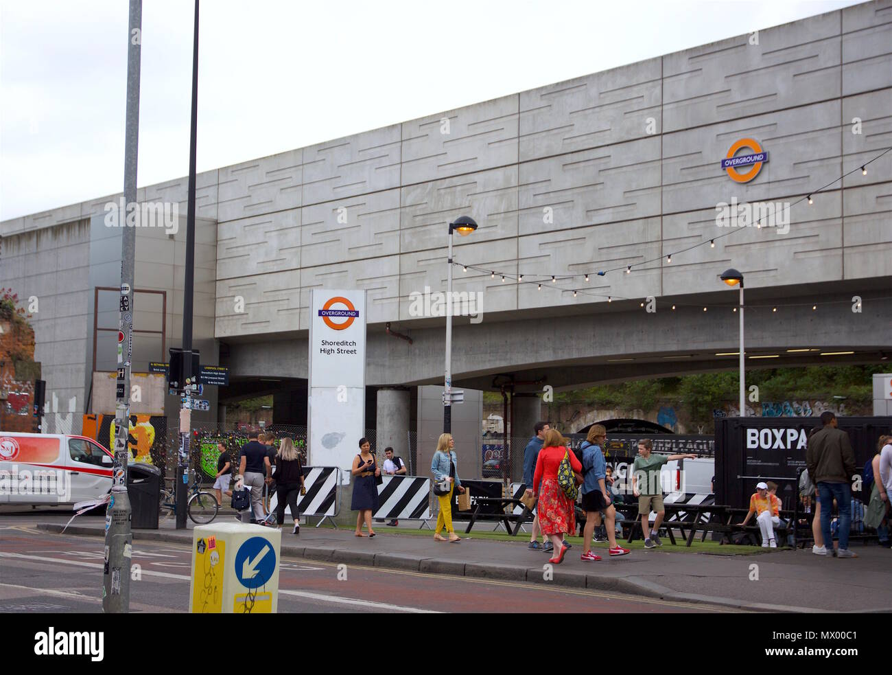 Shoreditch High street showing Boxpark Shoredtich and the sign for the overground station Stock Photo