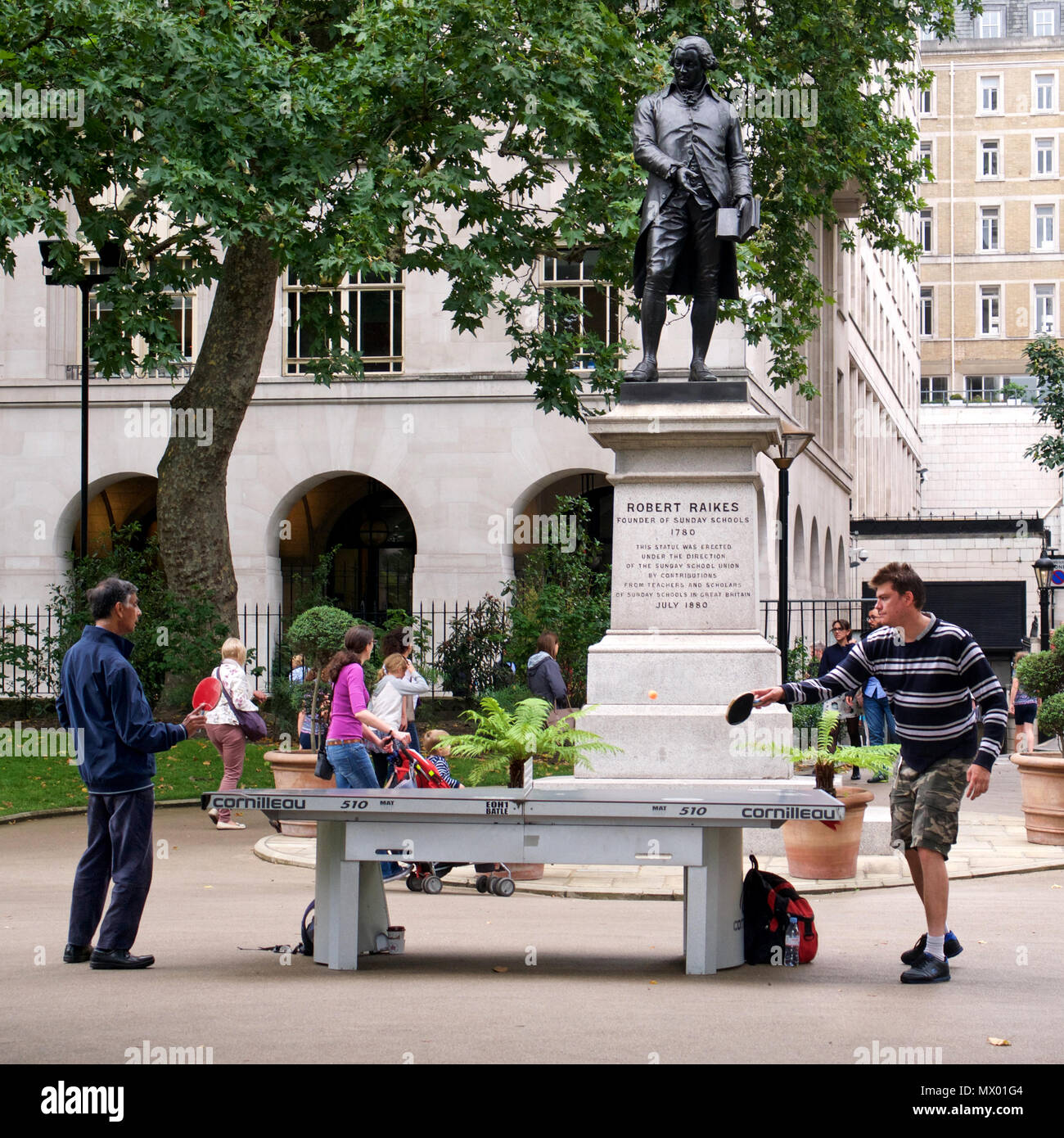 Men playing table tennis in the Victoria Embankment Gardens Stock Photo